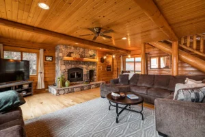 Main Floor Living Space. Ceiling Fans, canned lights, natural wood fireplace.