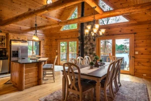 Open kitchen and dining area with tables and chairs.